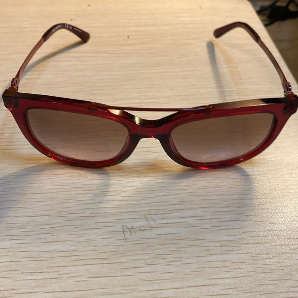 Tory Burch “Cranberry” sunglasses - New with case and dust bag.